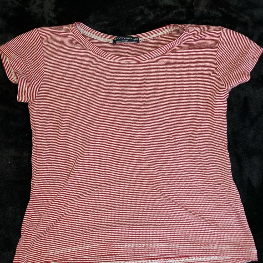 Red and white striped shirt sleeve
